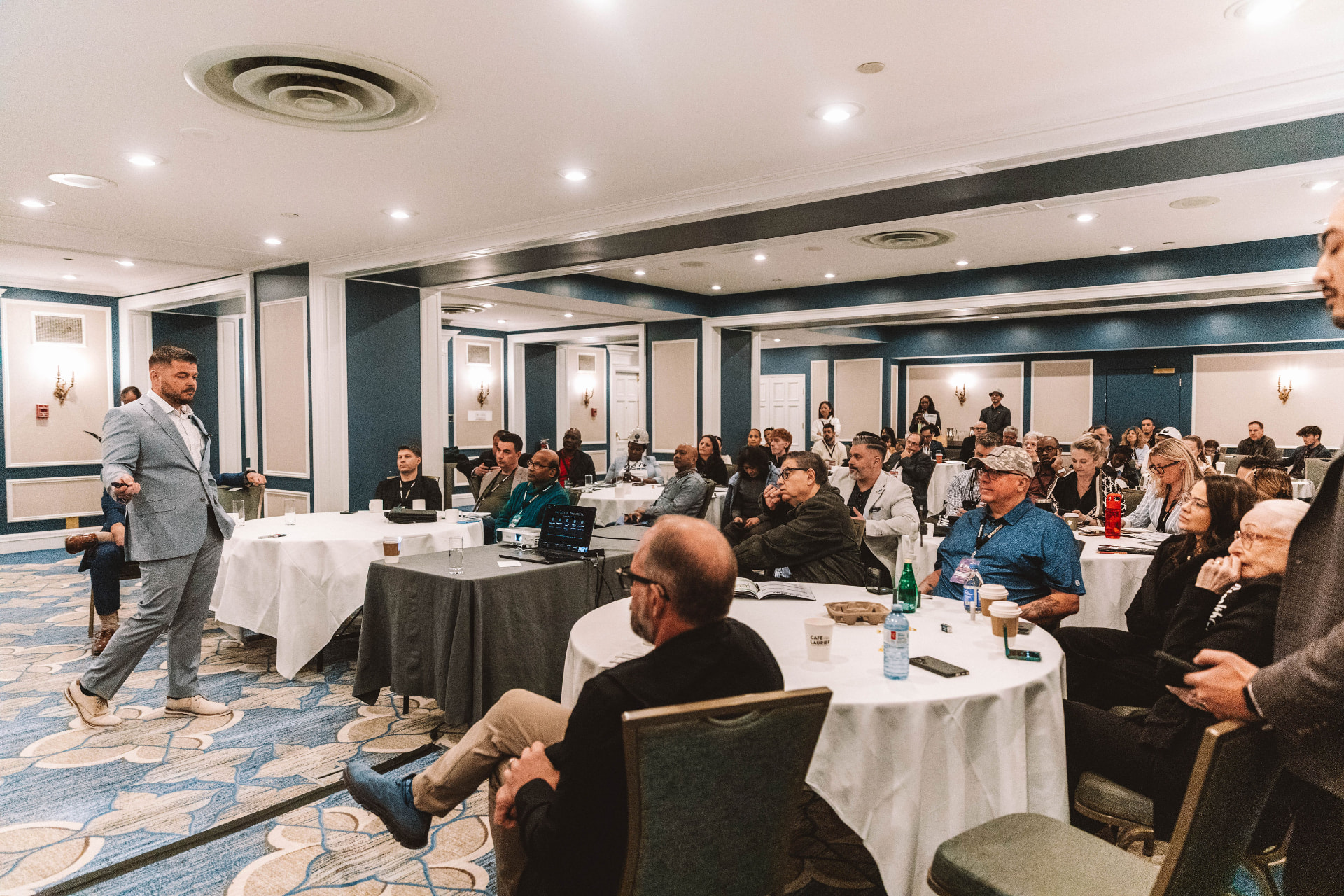 Yiannis Tsantilas presenting to a full room of investors
